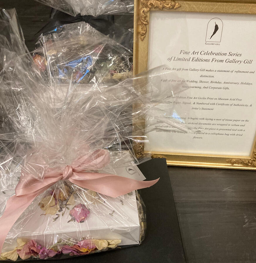 pink celebration box in cellophane